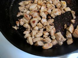 Cooking chicken in cast iron for Avocado Chicken Tacos